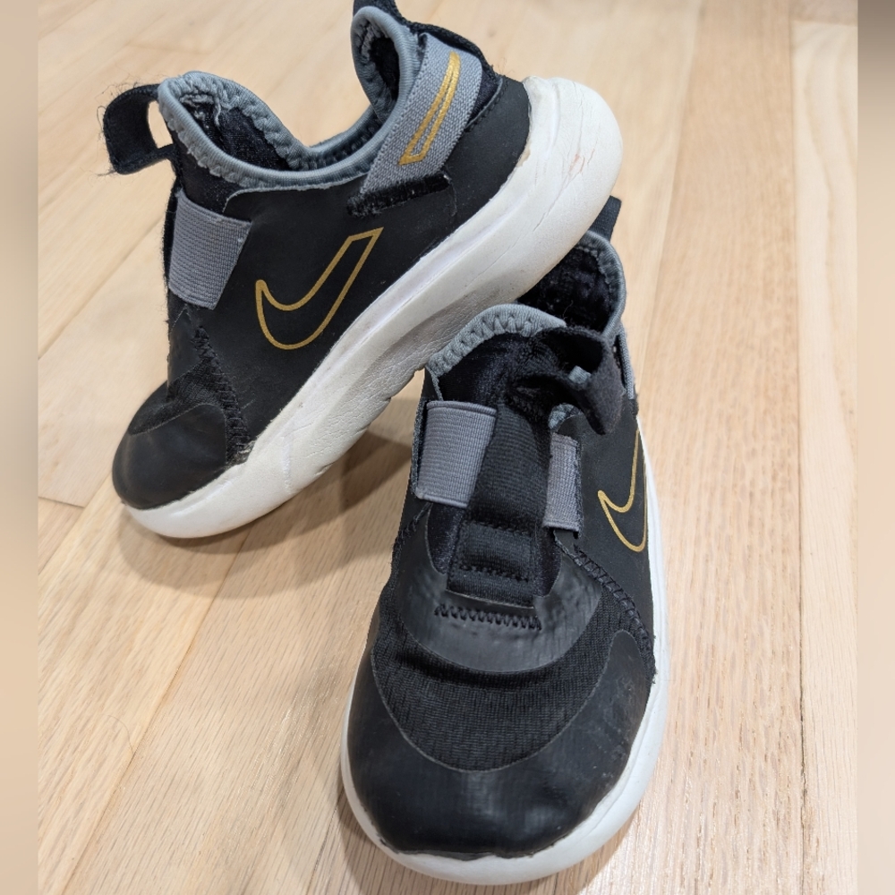 Nike Kids Black Sneakers with Gold Swoosh